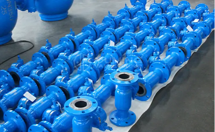 flanged-welded-ball-valve-batch-production-blue Batch of blue-coated flanged welded ball valves in factory production, showing uniform flanged end connections for industrial piping systems