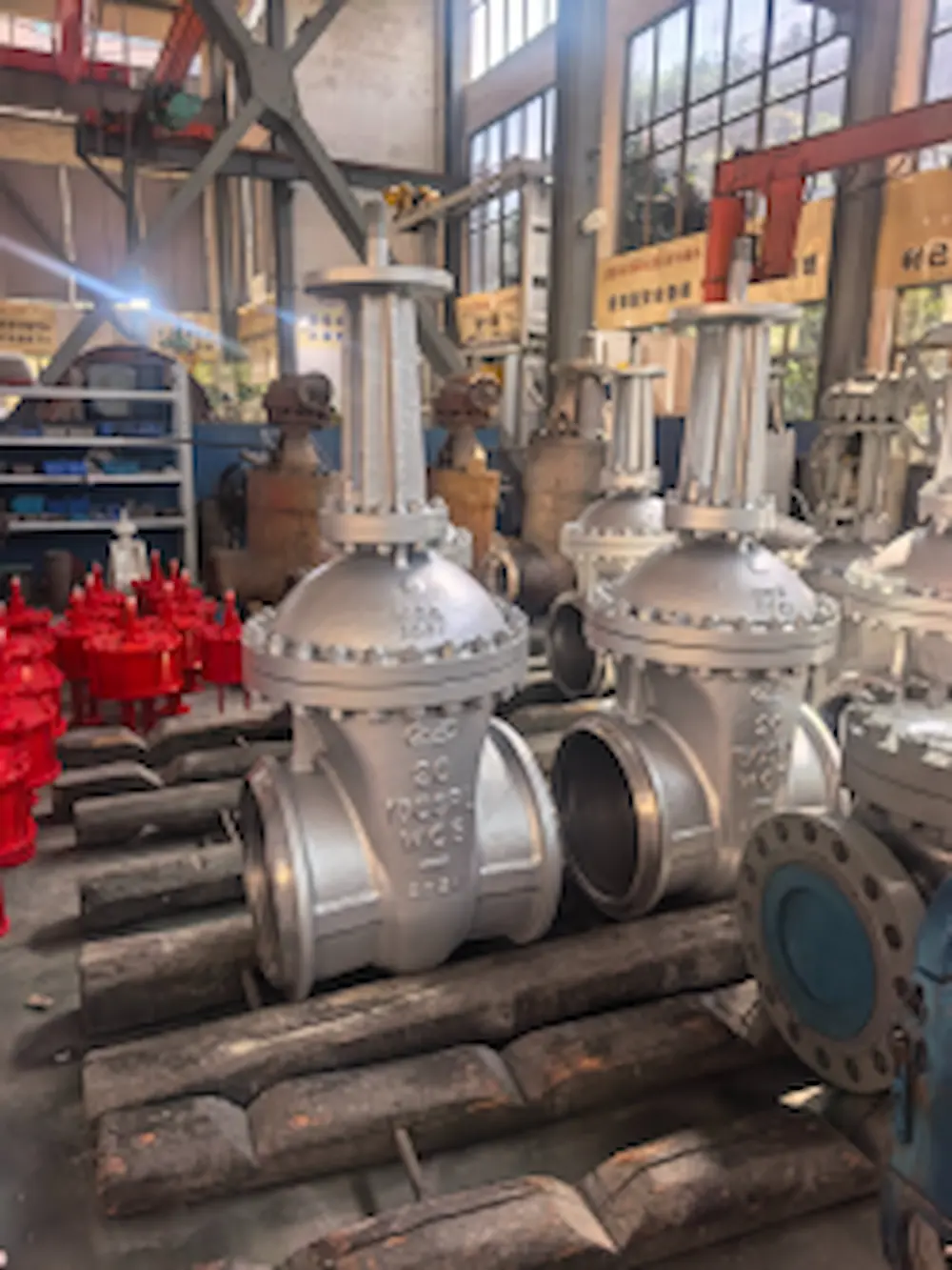 20 inch Class 150 WCB gate valves with bolted bonnet and rising stem yoke during factory assembly – Vcore Valve